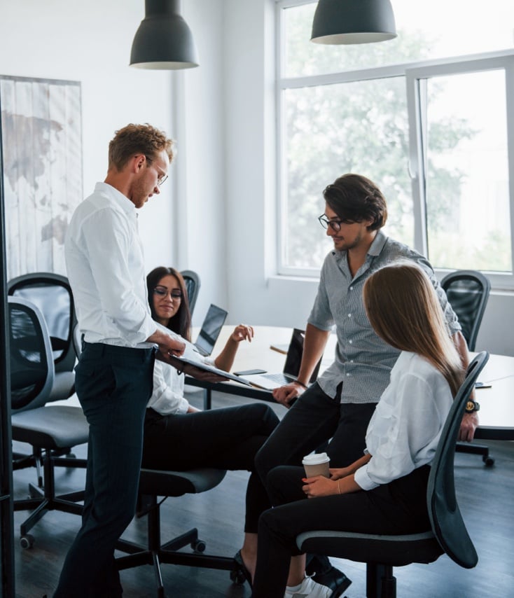 Employees having a standup meeting